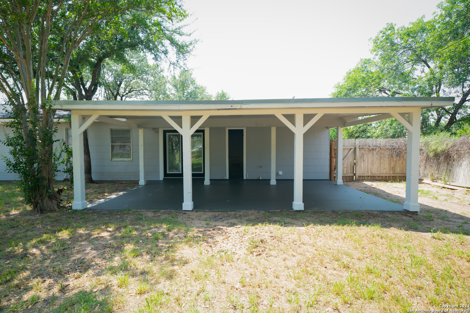 609 Hickory Highway Devine, TX 78016 - Photo 15 of 17 front view of a house with a yard