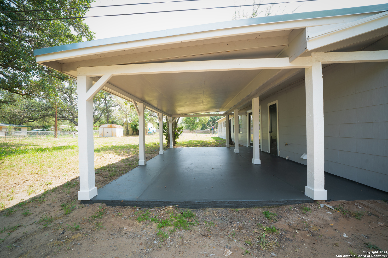 609 Hickory Highway Devine, TX 78016 - Photo 16 of 17 a view of a porch