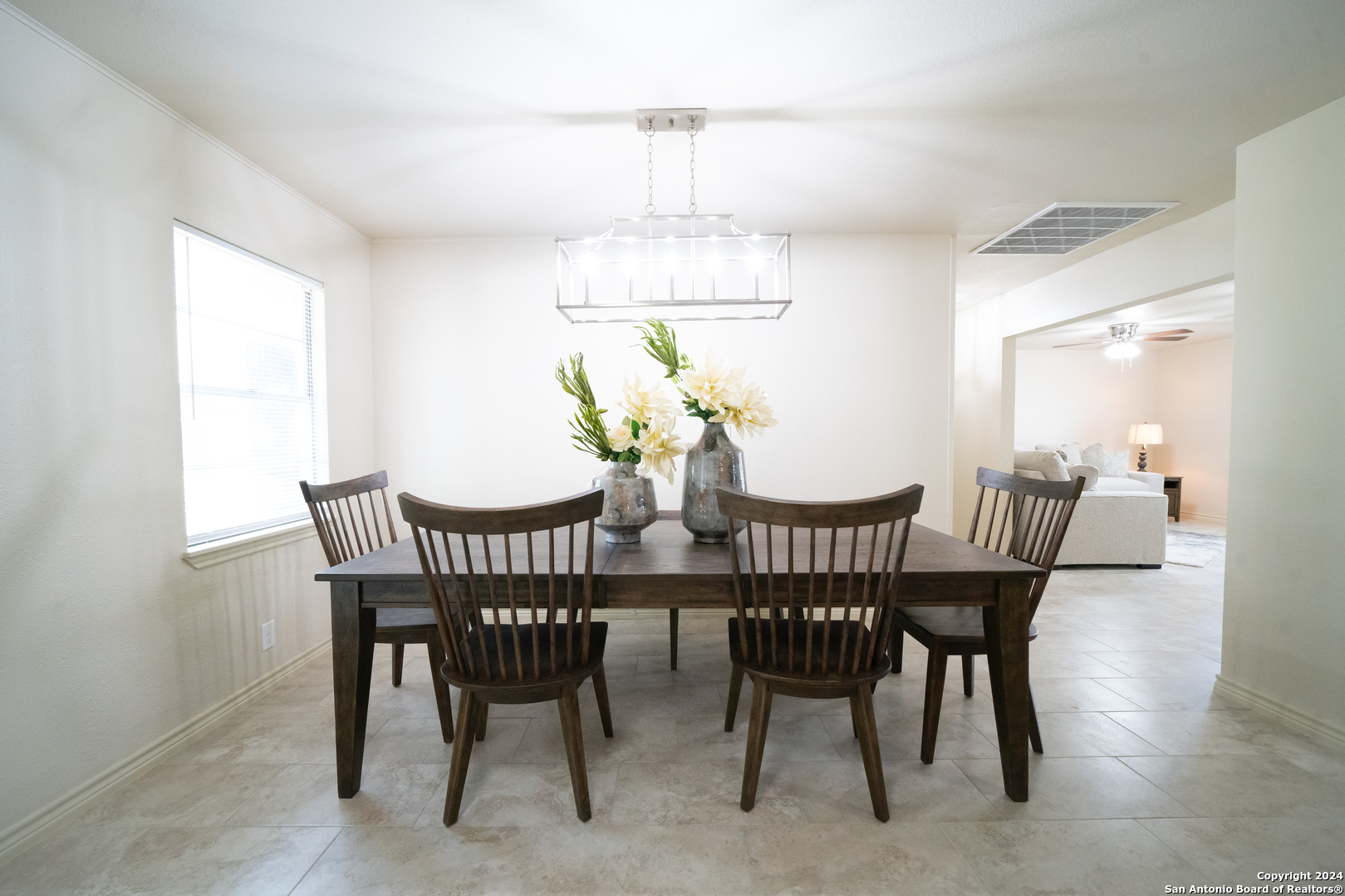 609 Hickory Highway Devine, TX 78016 - Photo 3 of 17 a view of a dining room with furniture window and outside view
