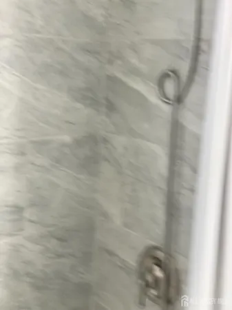 a close view of shower tap