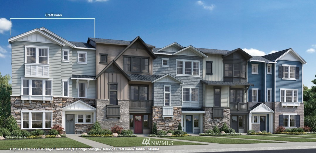 26542 Northeast Big Rock Road, Unit 101 Duvall, WA 98019 - Photo 2 of 19 a front view of a house with a yard