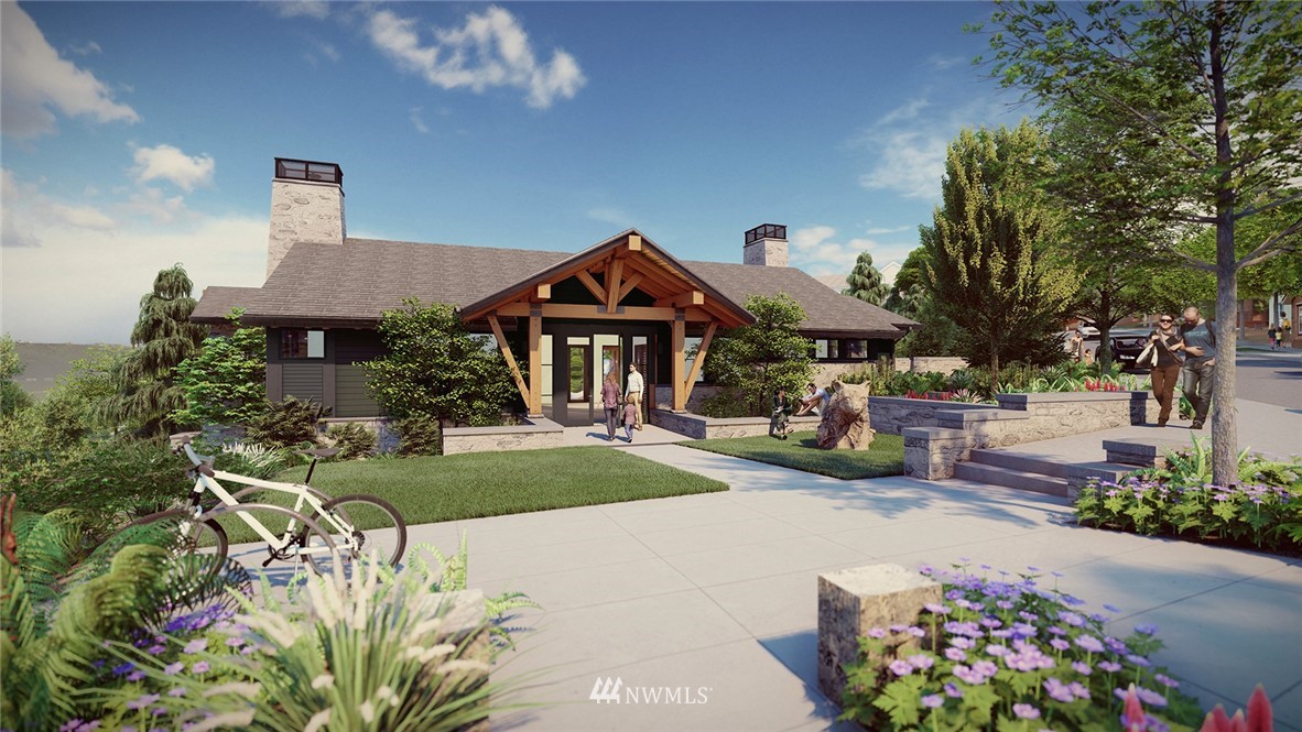 26542 Northeast Big Rock Road, Unit 101 Duvall, WA 98019 - Photo 14 of 19 a front view of a house with garden