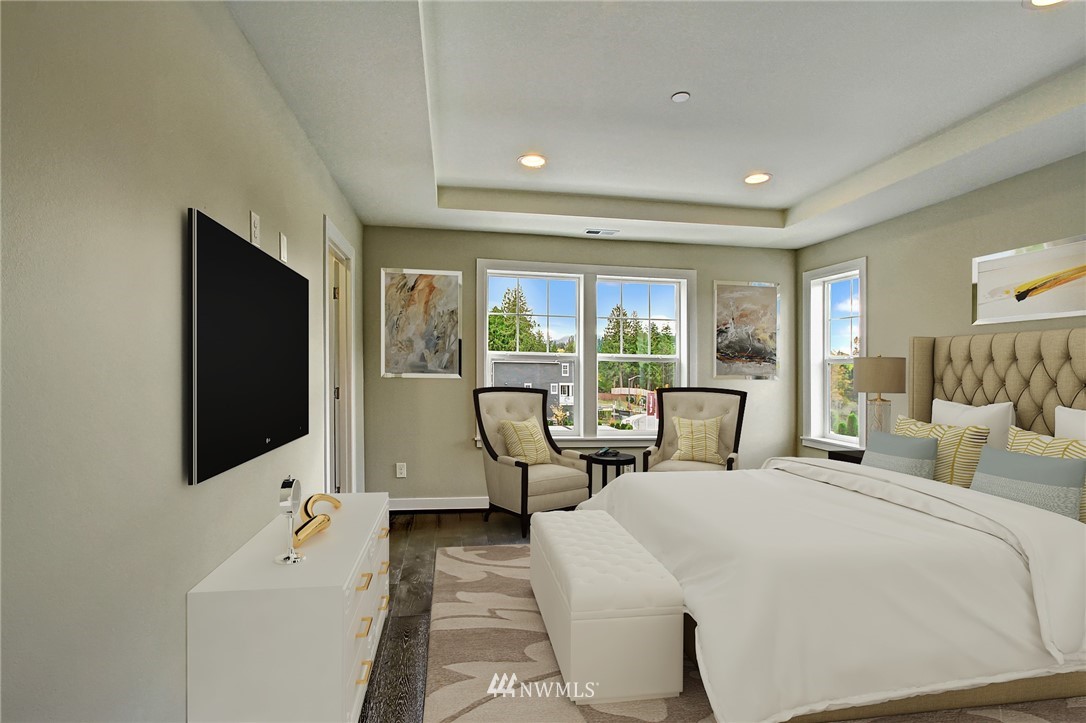 26542 Northeast Big Rock Road, Unit 101 Duvall, WA 98019 - Photo 8 of 19 a bedroom with double sink and a flat tv screen