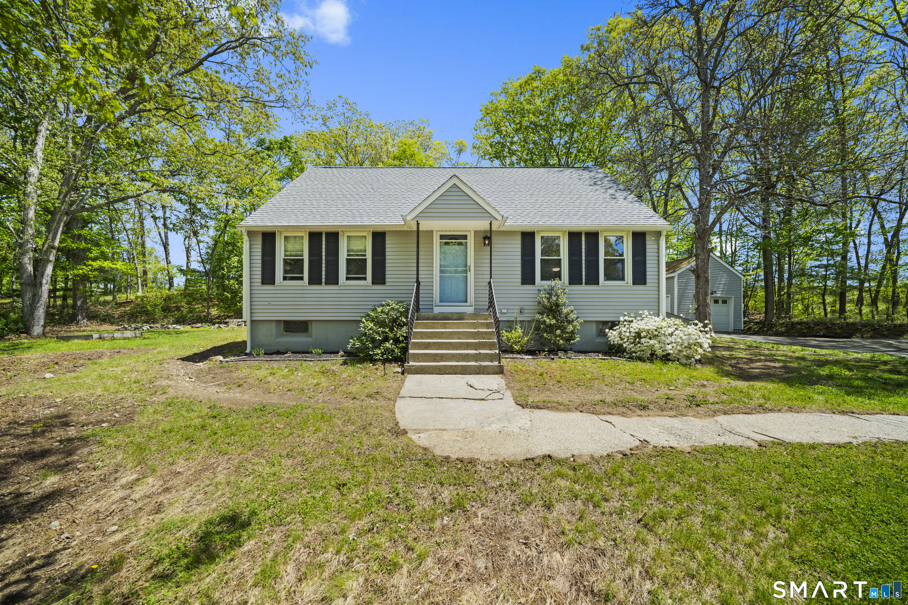 14 Church Street Sprague, CT 06330 - Photo 3 of 36 a front view of a house with a yard