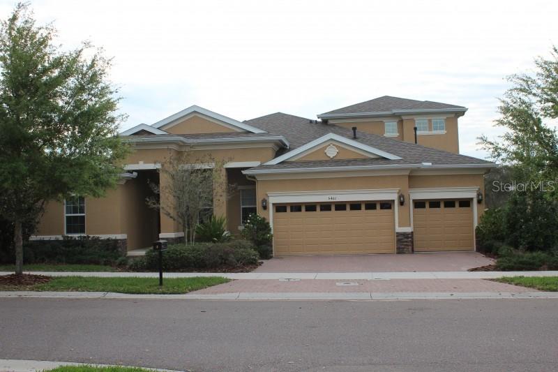 5401 Sanderling Ridge Drive Lithia, FL 33547 - Photo 1 of 1 a front view of a house with a yard and garage