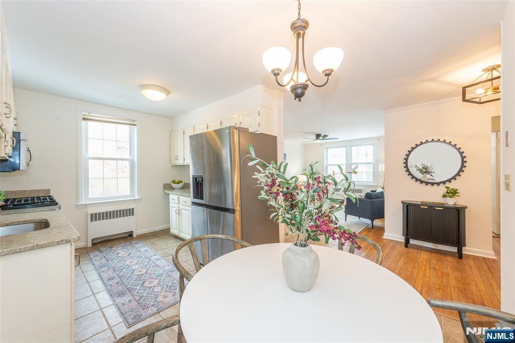 101 Gates Avenue, Unit 2A Montclair, NJ 07042 - Photo 13 of 21 a view of a dining room with furniture window and wooden floor