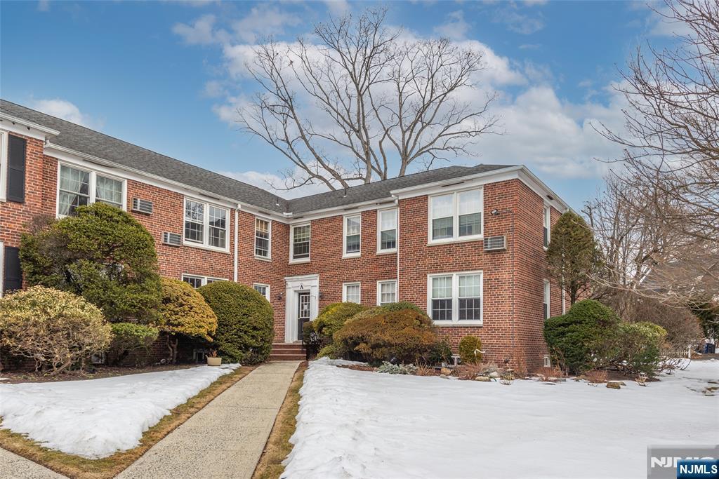 101 Gates Avenue, Unit 2A Montclair, NJ 07042 - Photo 20 of 21 a front view of a house with a yard
