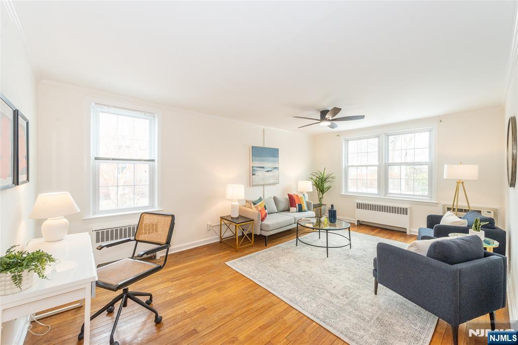 101 Gates Avenue, Unit 2A Montclair, NJ 07042 - Photo 3 of 21 a living room with furniture and a large window