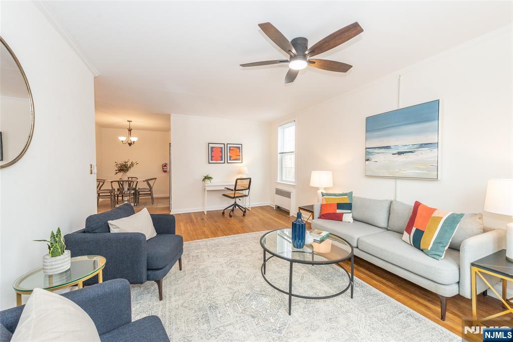 101 Gates Avenue, Unit 2A Montclair, NJ 07042 - Photo 4 of 21 a living room with furniture and a large window