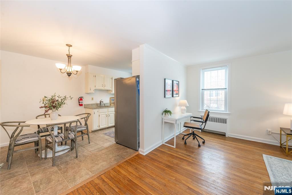 101 Gates Avenue, Unit 2A Montclair, NJ 07042 - Photo 9 of 21 a workspace with furniture hardwood and a window