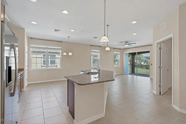 a lobby with furniture and window