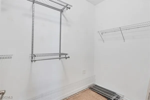 a view of a room with racks on the wall