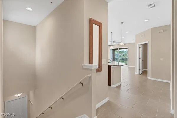 a kitchen with stainless steel appliances a refrigerator and a sink