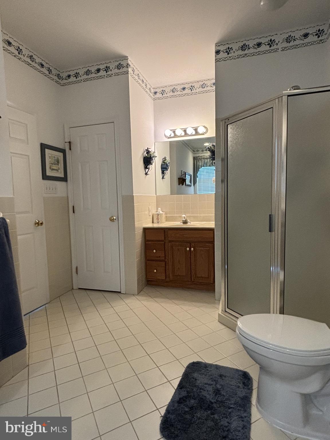 4848 Shepherd Street Brookhaven, PA 19015 - Photo 15 of 41 full view of master bath, vanity and linen closet