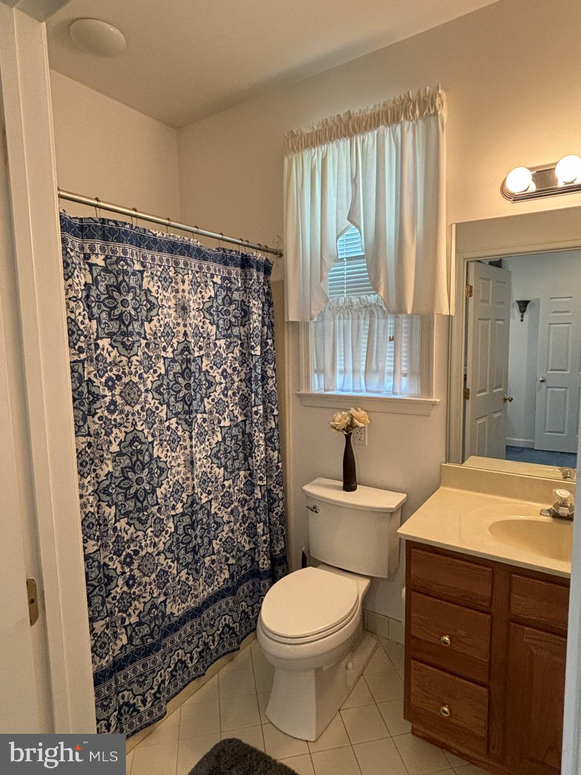 4848 Shepherd Street Brookhaven, PA 19015 - Photo 21 of 41 Hall bath with shower/tub and wood vanity