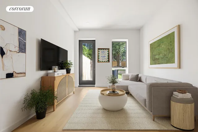 a living room with furniture a flat screen tv and a large window