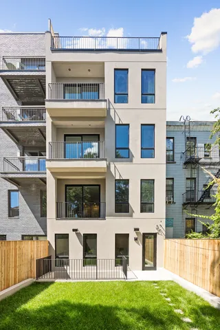 a building with a window and balcony