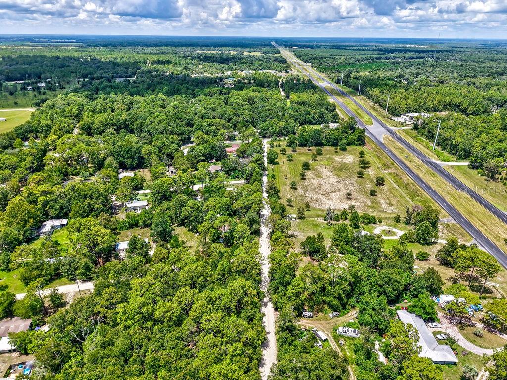 Northeast 51st Place Williston, FL 32696 - Photo 8 of 17 a view of a garden with a park