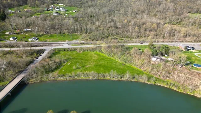 a view of lake with green space