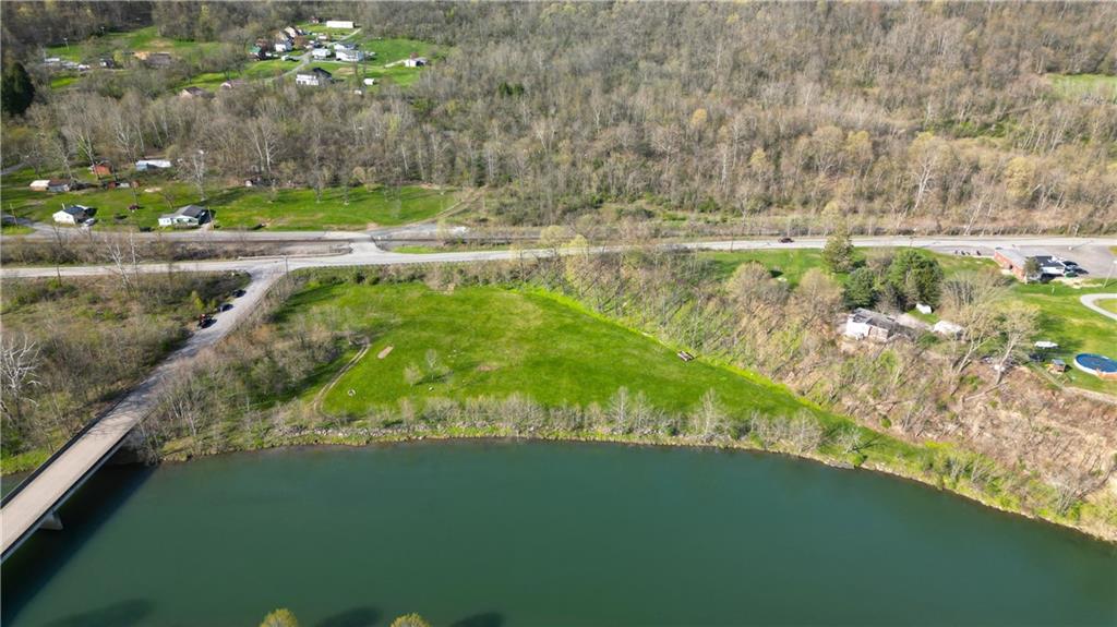 a view of lake with green space