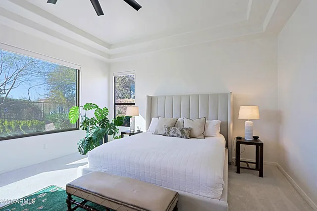 a view of kitchen island with stainless steel appliances kitchen island sink refrigerator and stove