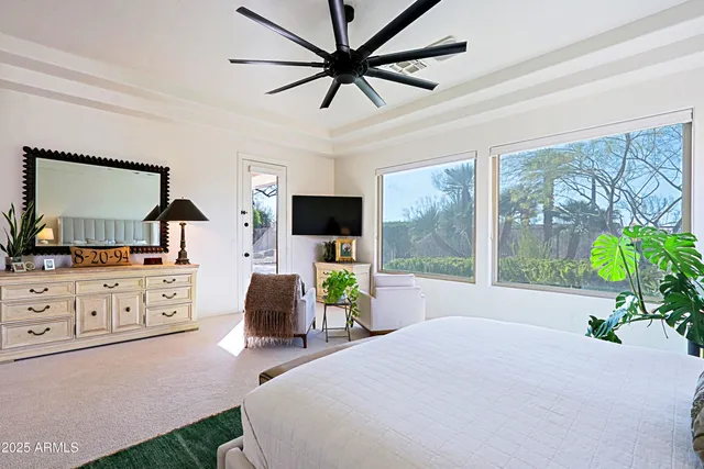 a view of yard from terrace with seating space