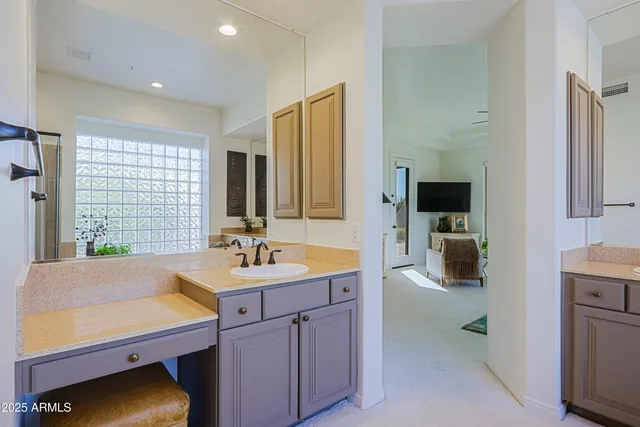 a view of a swimming pool with a patio