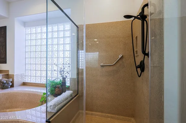 a view of a lake with boats and trees in the background