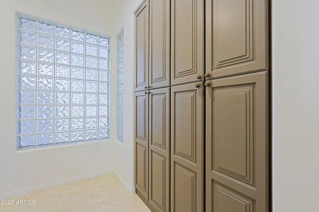 a view of swimming pool with outdoor seating and city view