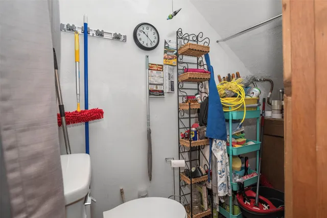 a bathroom with a toilet and a sink