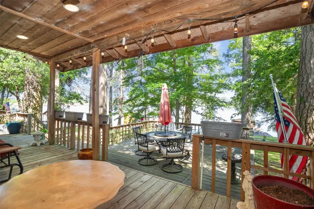 a view of a chairs and table in the patio