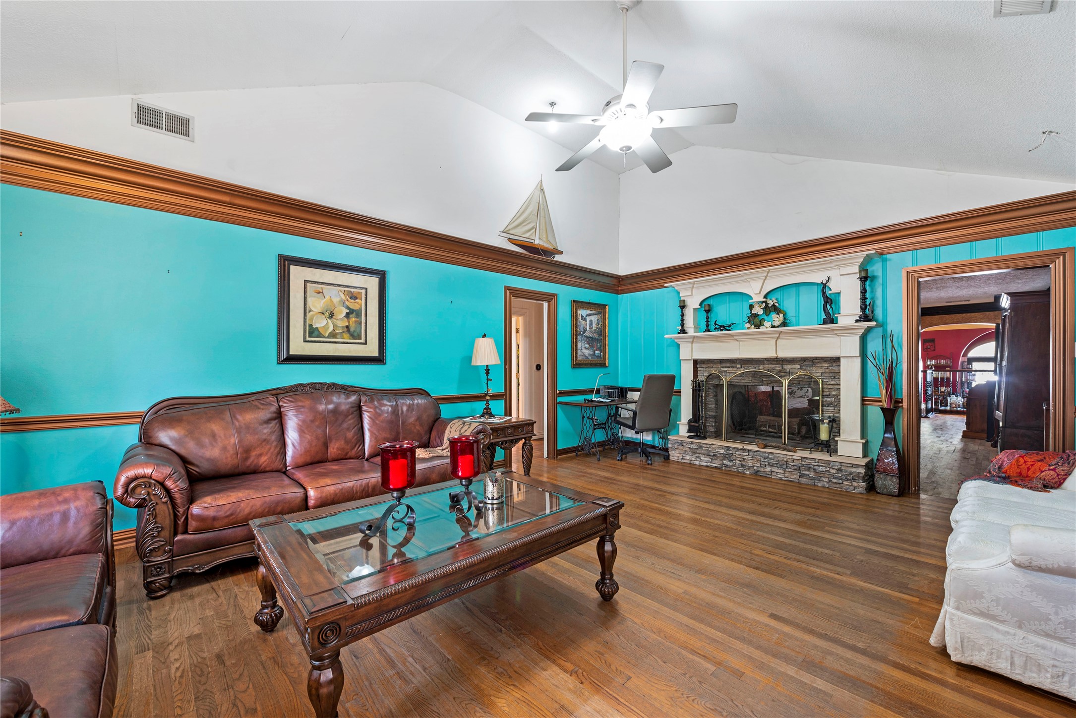 1135 West 26th Street, Unit 5 Houston, TX 77008 - Photo 18 of 30 a living room with furniture and a fireplace