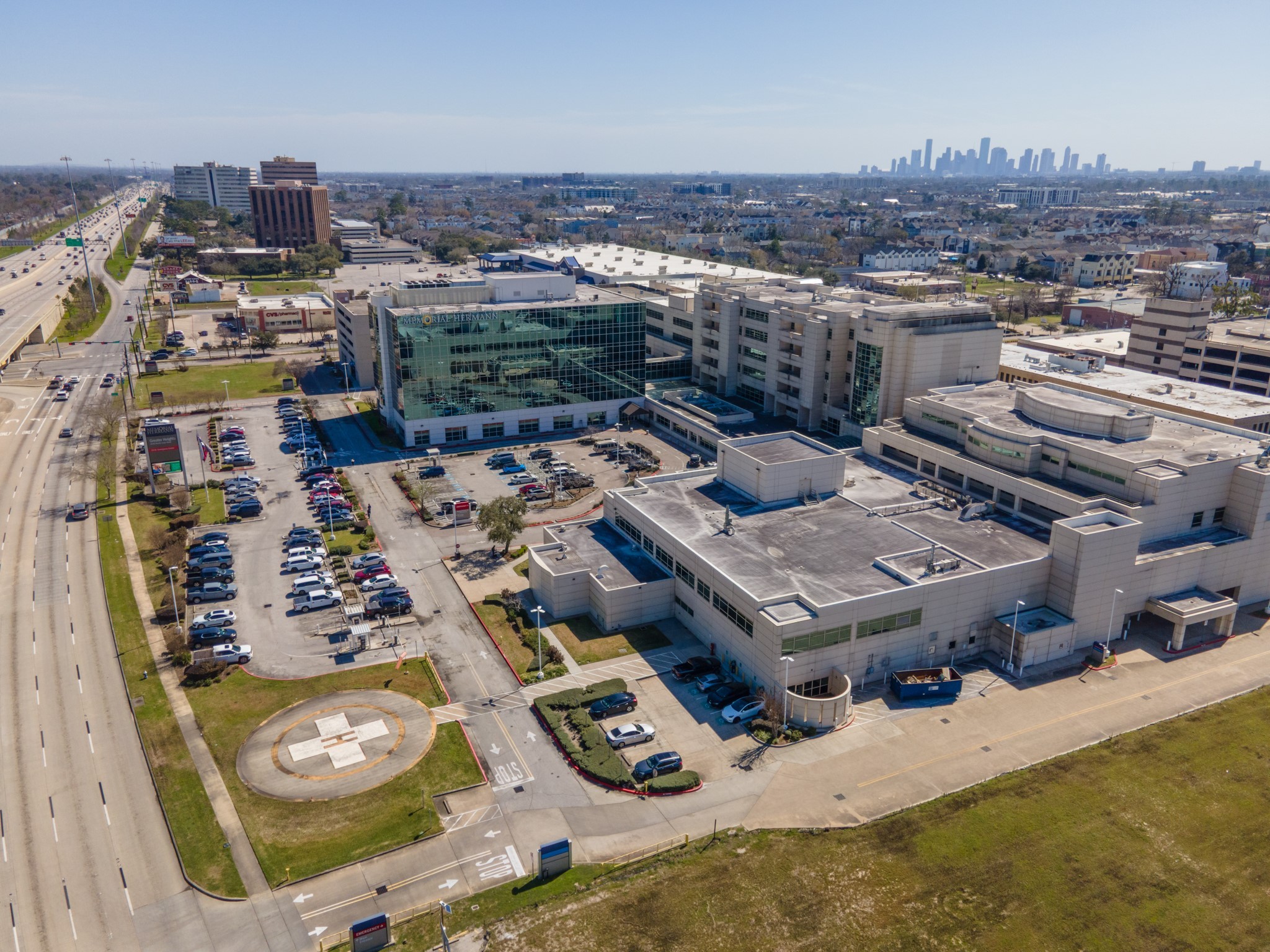 1135 West 26th Street, Unit 5 Houston, TX 77008 - Photo 20 of 30 an aerial view of a house with yard kitchen kitchen island and stainless steel appliances