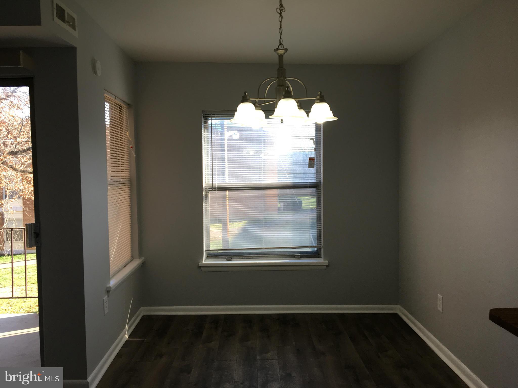3803 St Barnabas Road, Unit T Suitland, MD 20746 - Photo 7 of 13 a view of a room that has a window in it