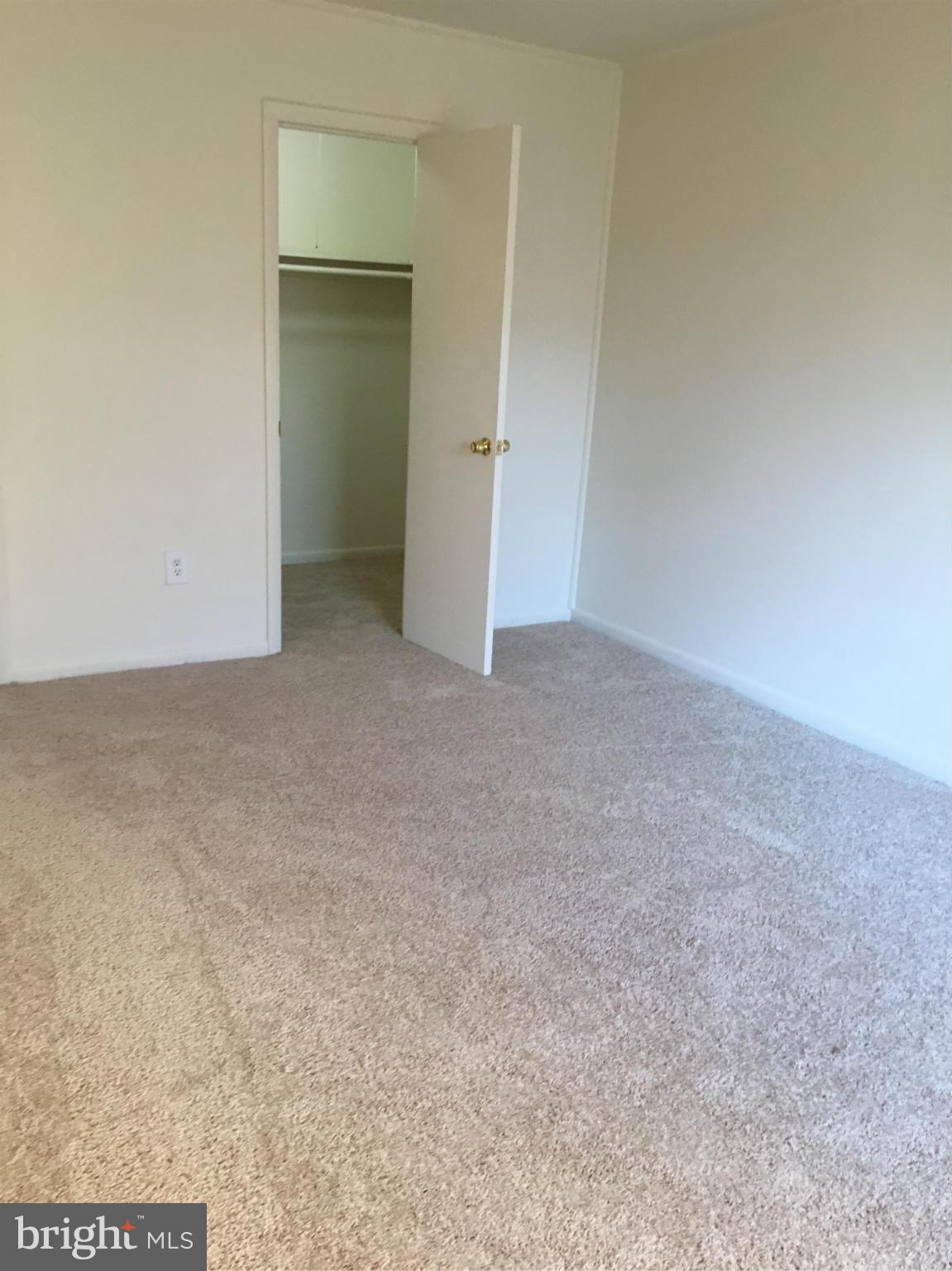 3803 St Barnabas Road, Unit T Suitland, MD 20746 - Photo 10 of 13 a view of an empty room and closet