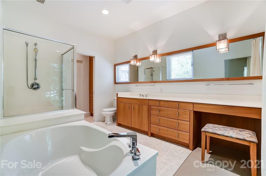 1860 Montague Road Clover, SC 29710 - Photo 33 of 48 a spacious bathroom with a tub sink and mirror