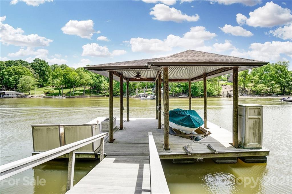 1860 Montague Road Clover, SC 29710 - Photo 45 of 48 a view of a lake with a table and chairs