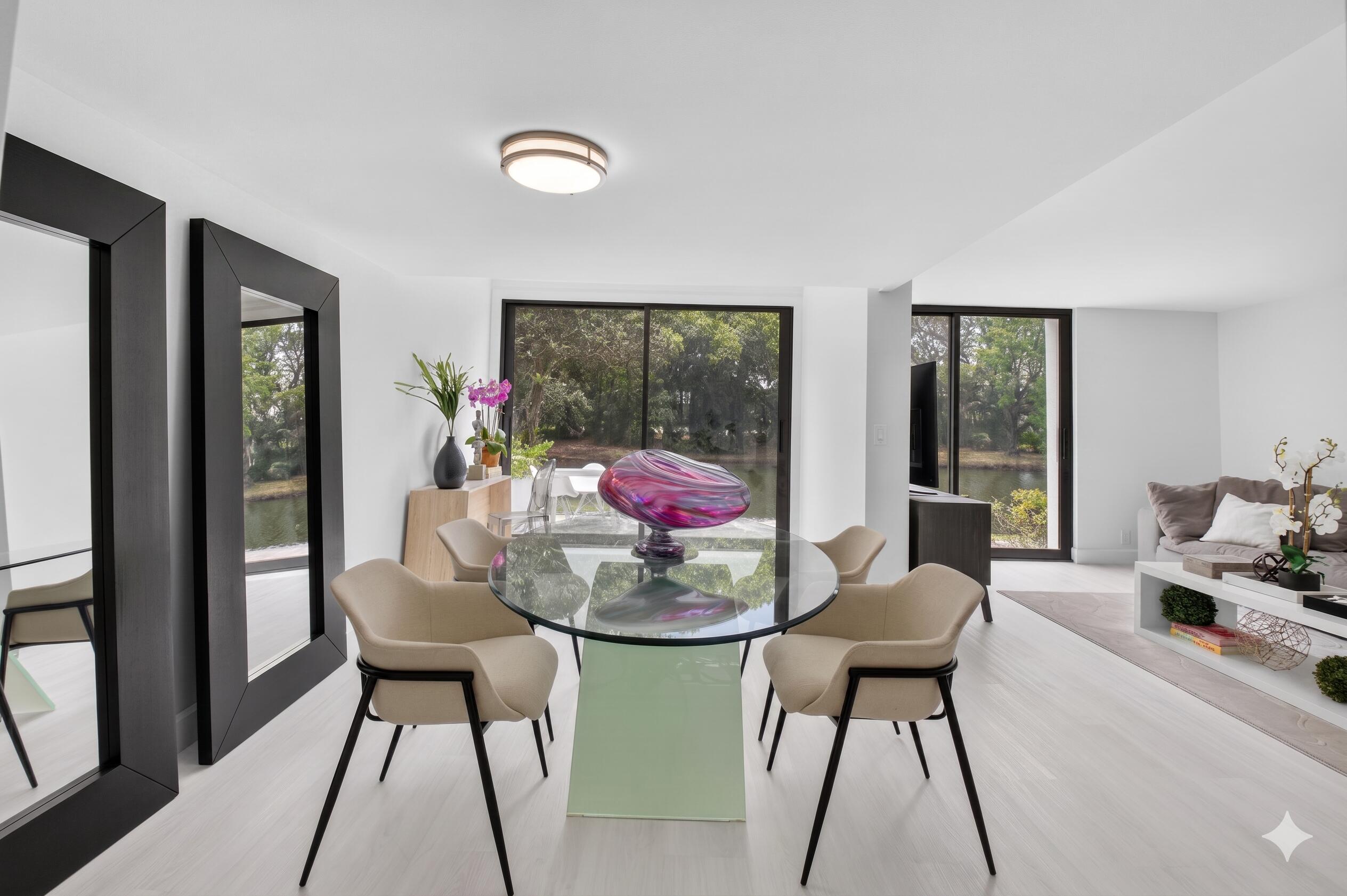 3708 Bridgewood Drive Boca Raton, FL 33434 - Photo 1 of 37 a living room with dining room and white furniture