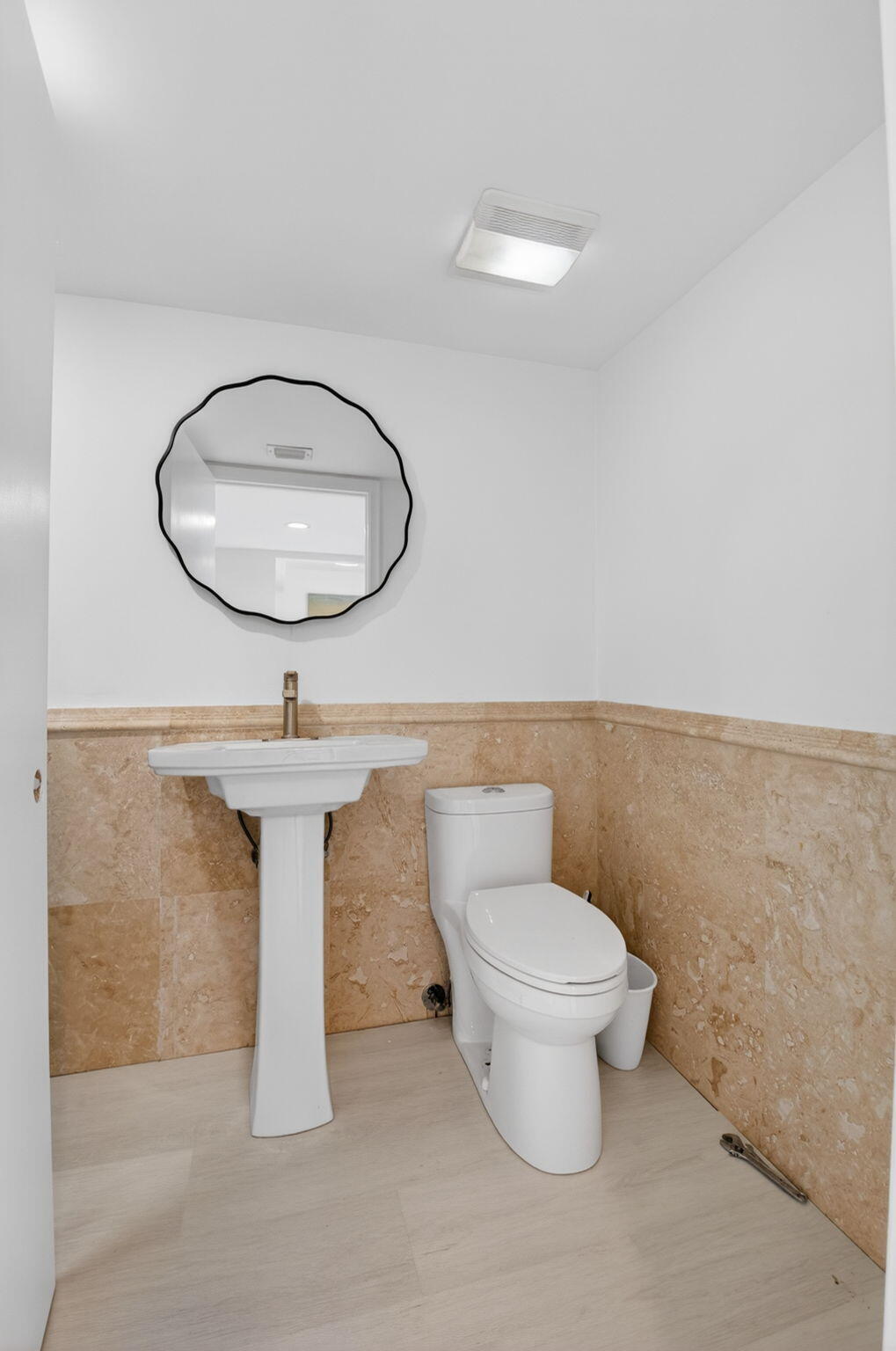 3708 Bridgewood Drive Boca Raton, FL 33434 - Photo 15 of 37 a bathroom with a toilet sink and mirror