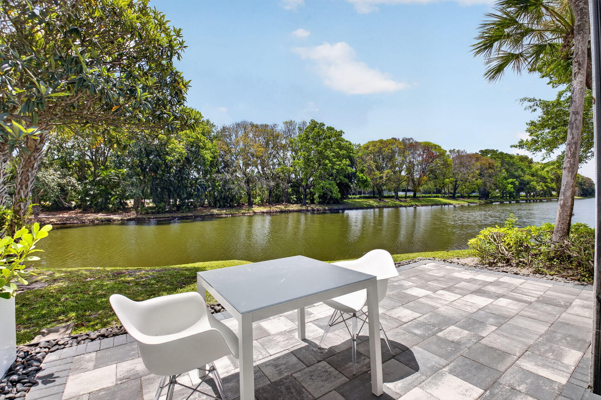 3708 Bridgewood Drive Boca Raton, FL 33434 - Photo 17 of 37 a lake view with a garden