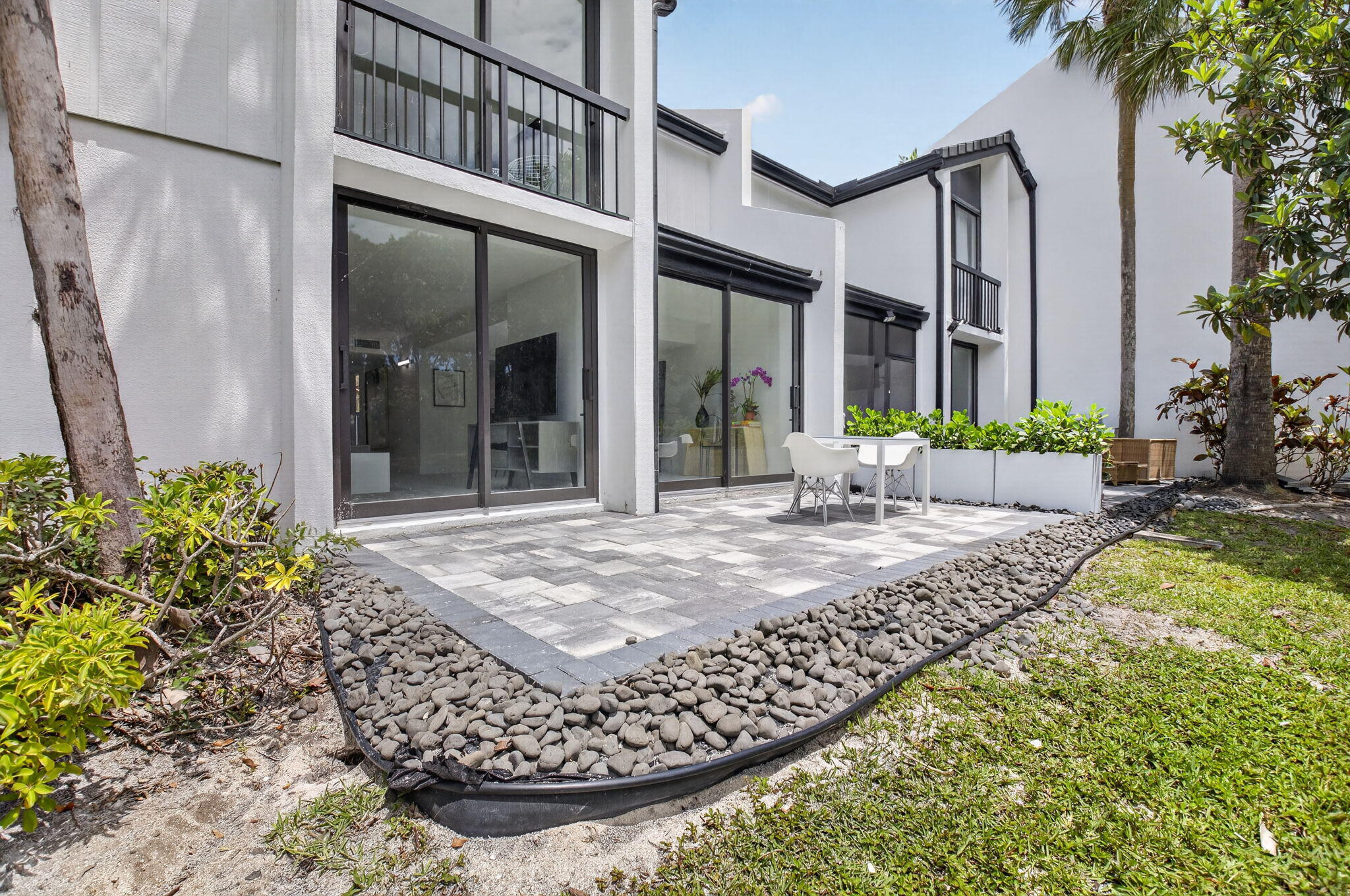 3708 Bridgewood Drive Boca Raton, FL 33434 - Photo 20 of 37 a front view of a house with garden