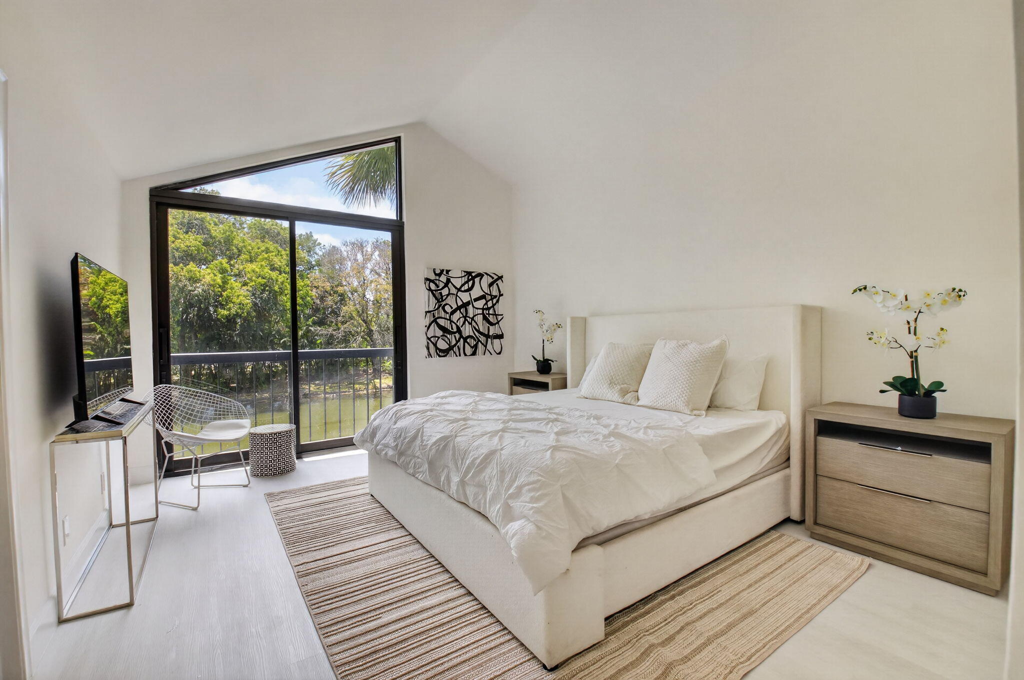 3708 Bridgewood Drive Boca Raton, FL 33434 - Photo 27 of 37 a bedroom with a bed and a large window
