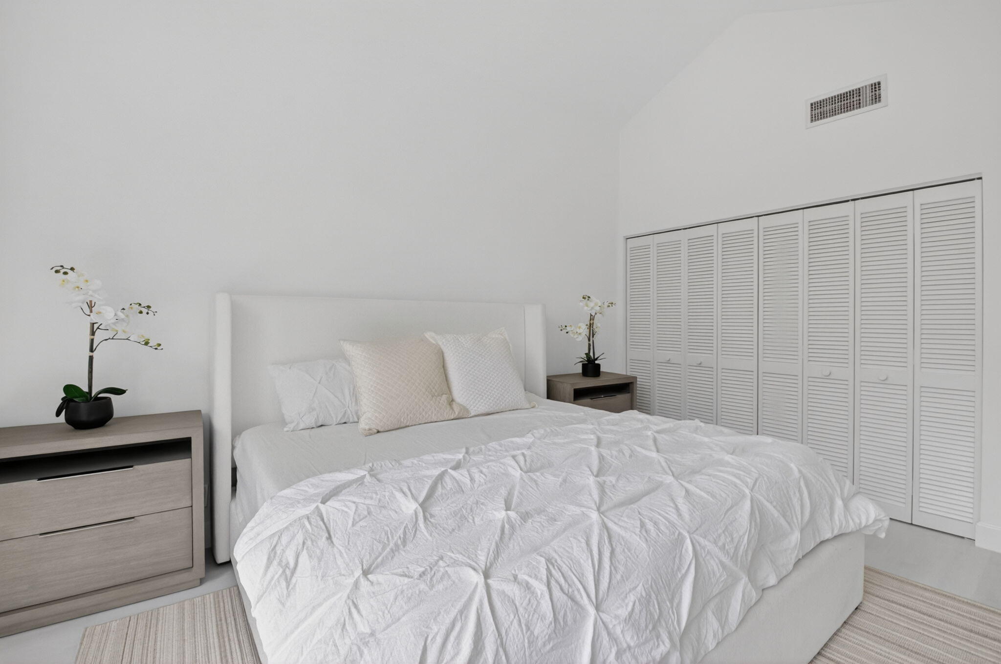 3708 Bridgewood Drive Boca Raton, FL 33434 - Photo 28 of 37 a bedroom with a bed and a cabinets