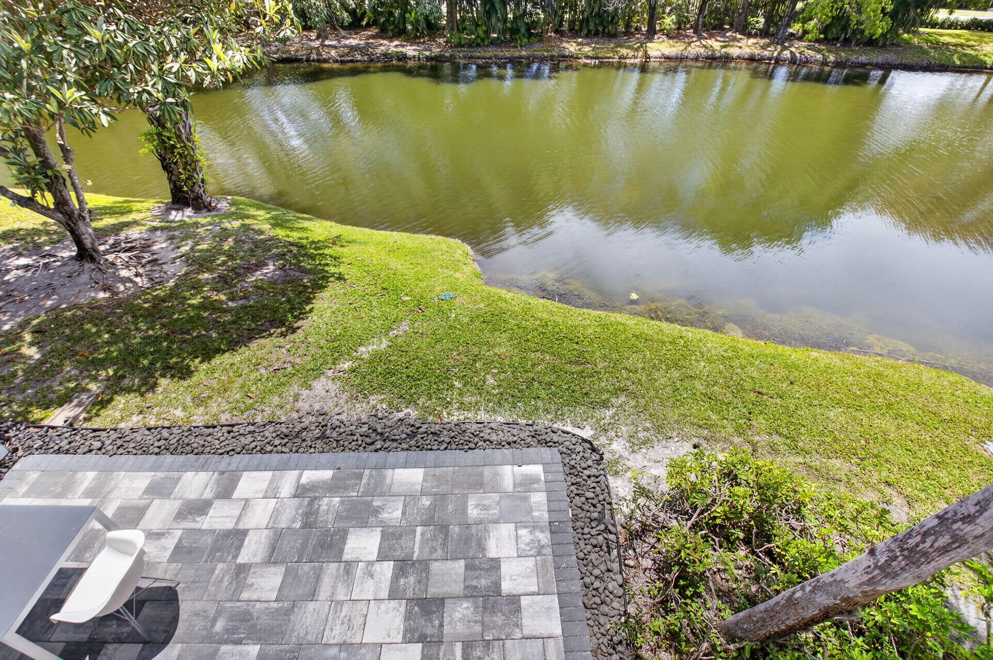 3708 Bridgewood Drive Boca Raton, FL 33434 - Photo 30 of 37 a view of a lake with a mountain view