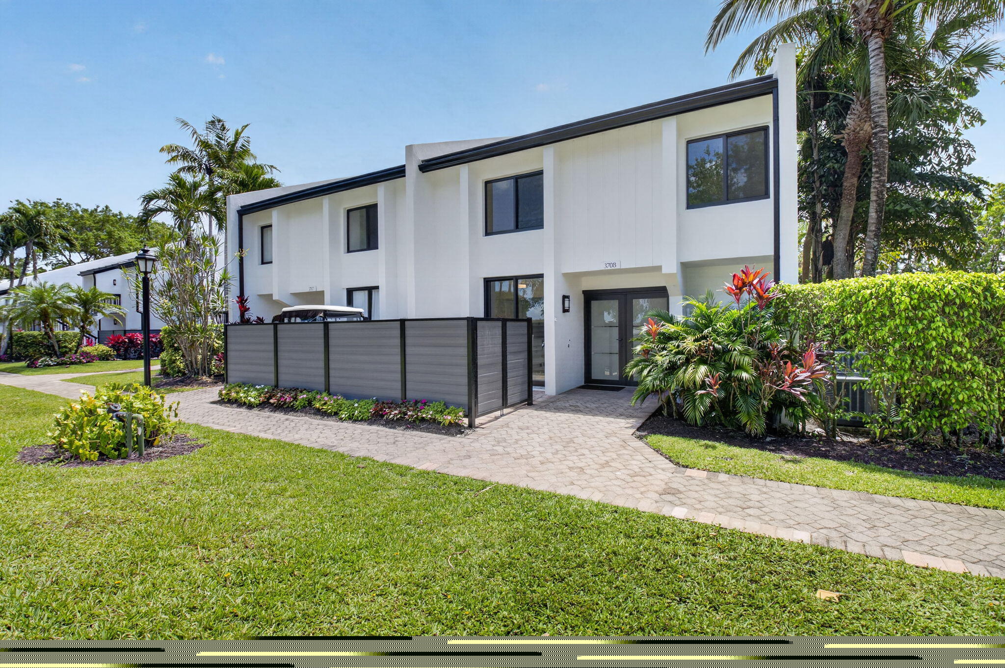 3708 Bridgewood Drive Boca Raton, FL 33434 - Photo 33 of 37 a view of a house with backyard and garden