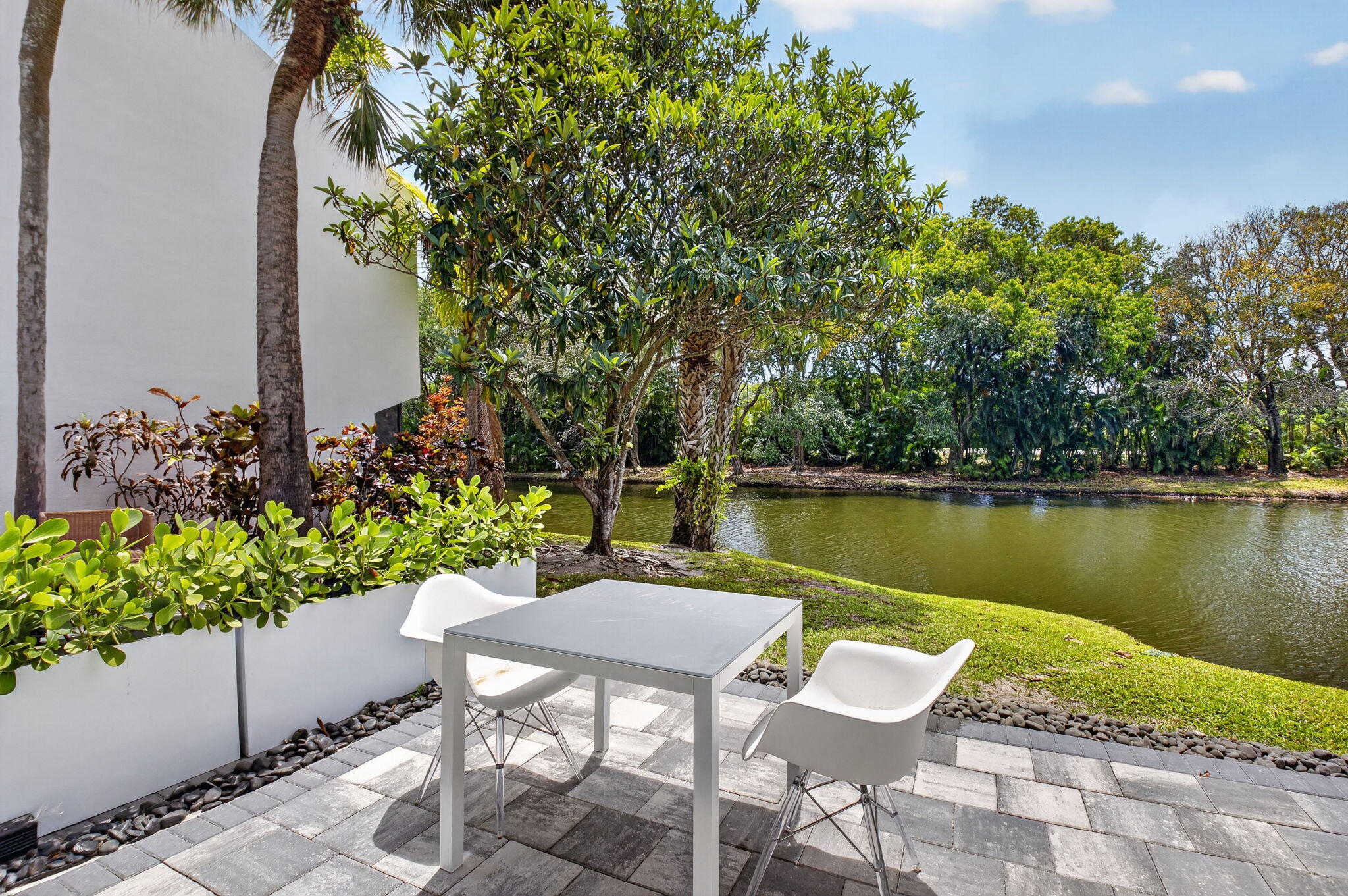3708 Bridgewood Drive Boca Raton, FL 33434 - Photo 5 of 37 a view of a chair and table on the terrace