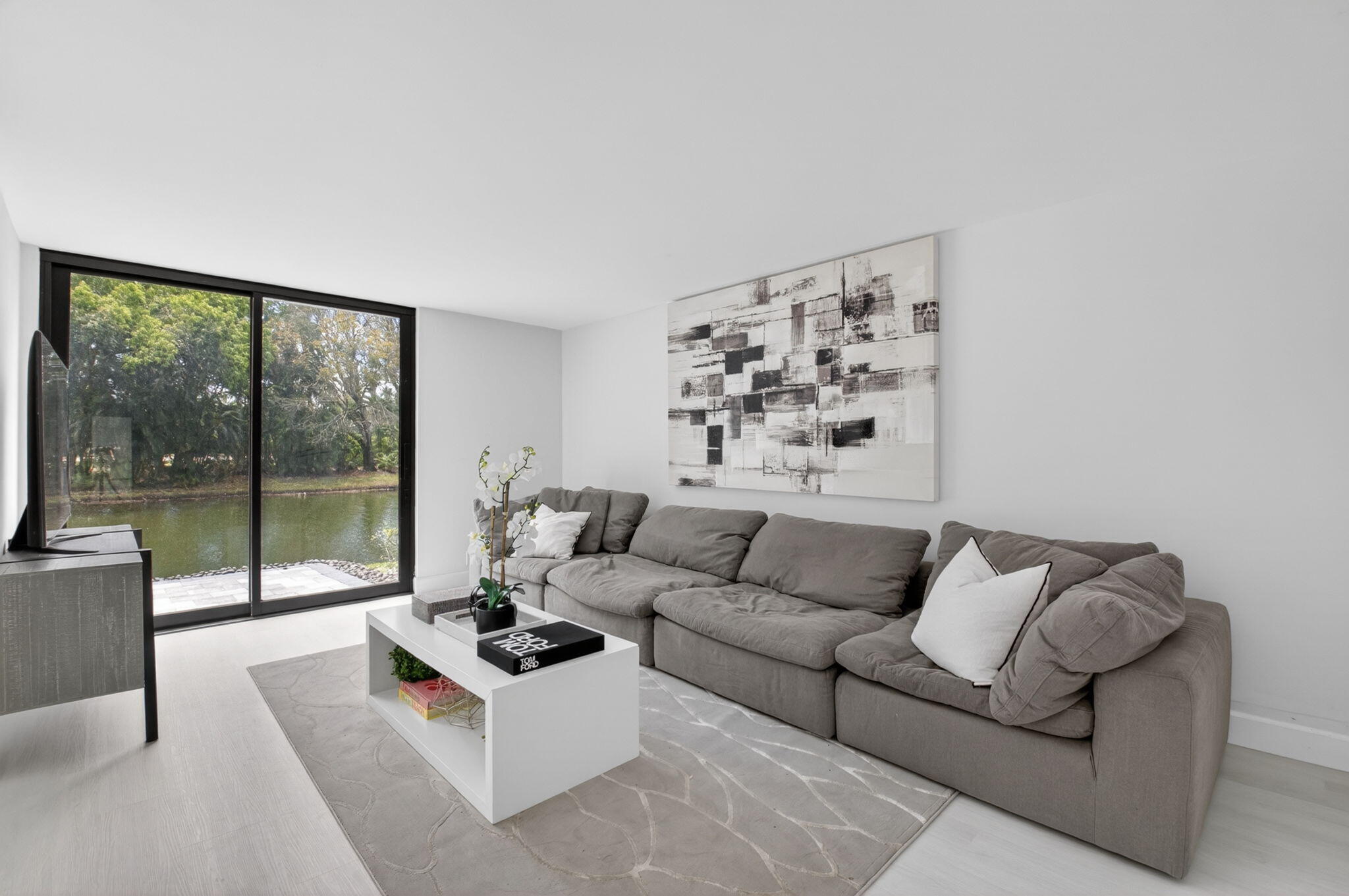 3708 Bridgewood Drive Boca Raton, FL 33434 - Photo 6 of 37 a living room with furniture and a large window