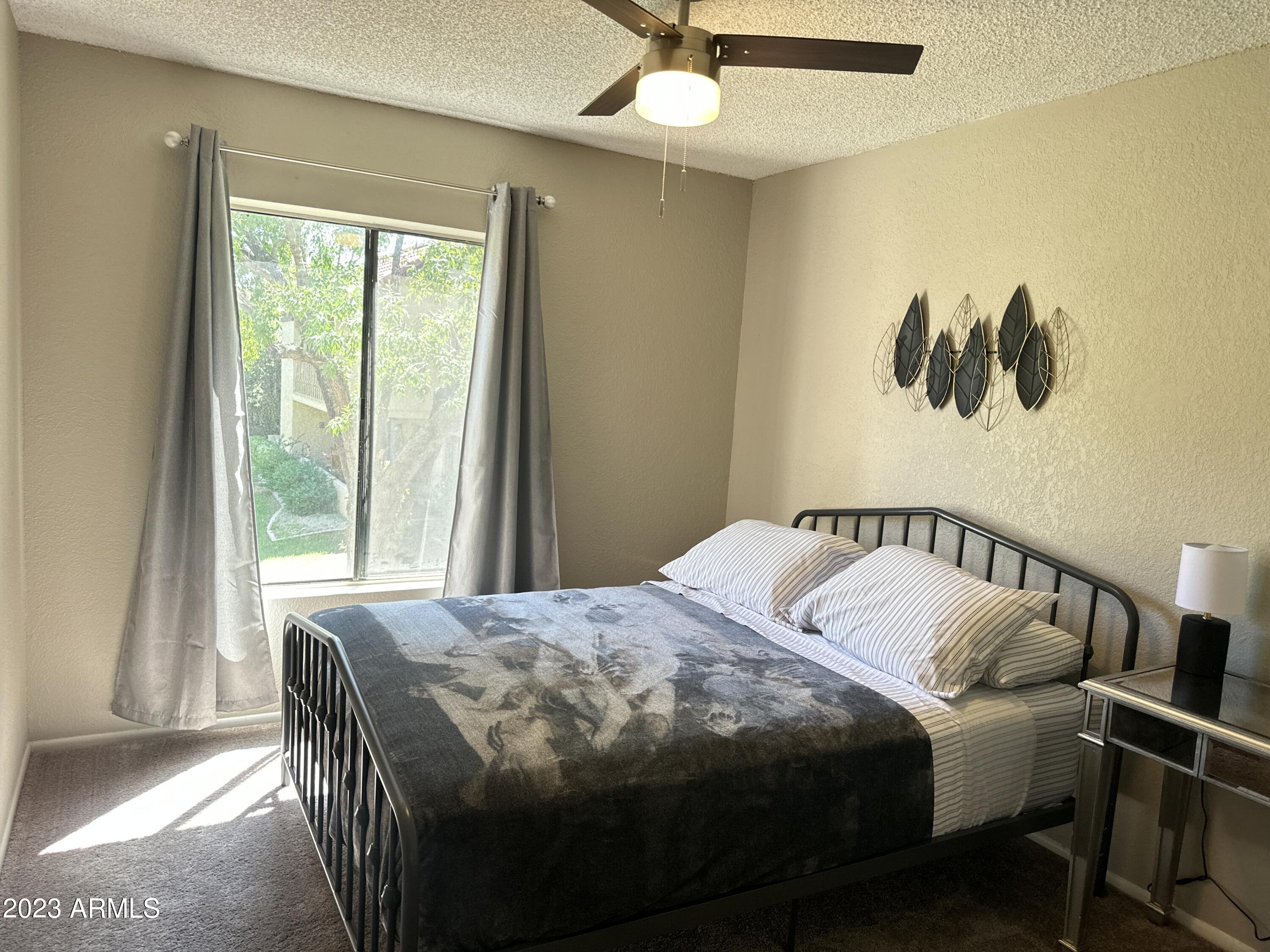 8649 East Royal Palm Road, Unit 214 Scottsdale, AZ 85258 - Photo 11 of 16 Guest bedroom