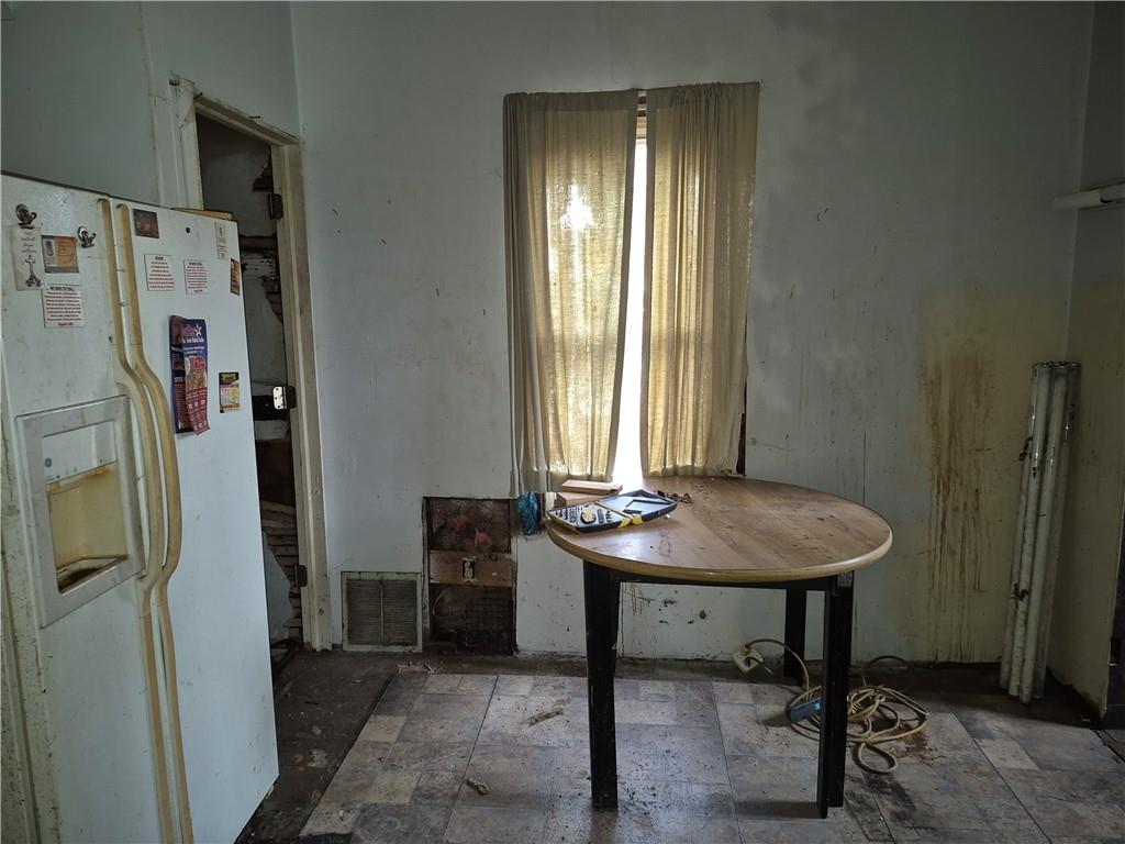 689 South State Line Road Sharon, PA 16146 - Photo 7 of 19 a view of a room that has a bed and a table in it