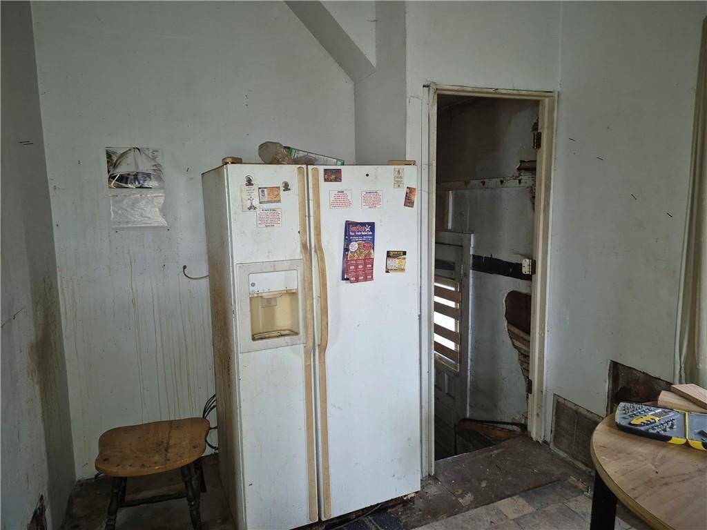 689 South State Line Road Sharon, PA 16146 - Photo 8 of 19 a white refrigerator freezer sitting in a kitchen
